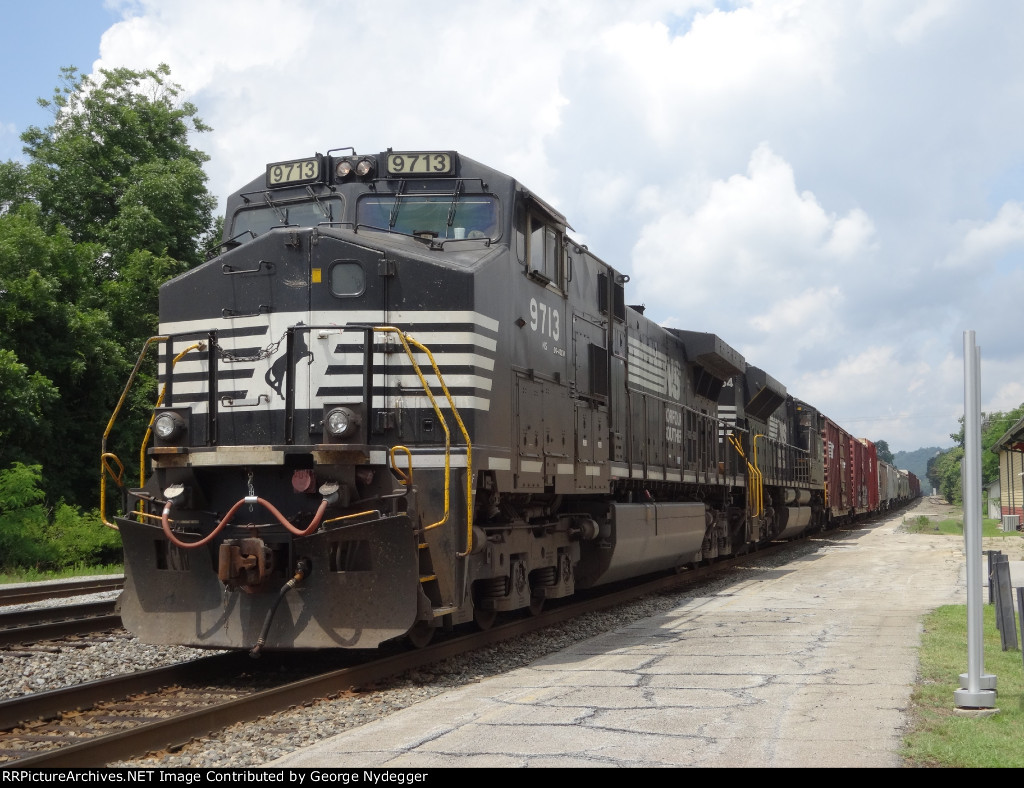 NS 9713 & 2664 are leading a mixed freight train